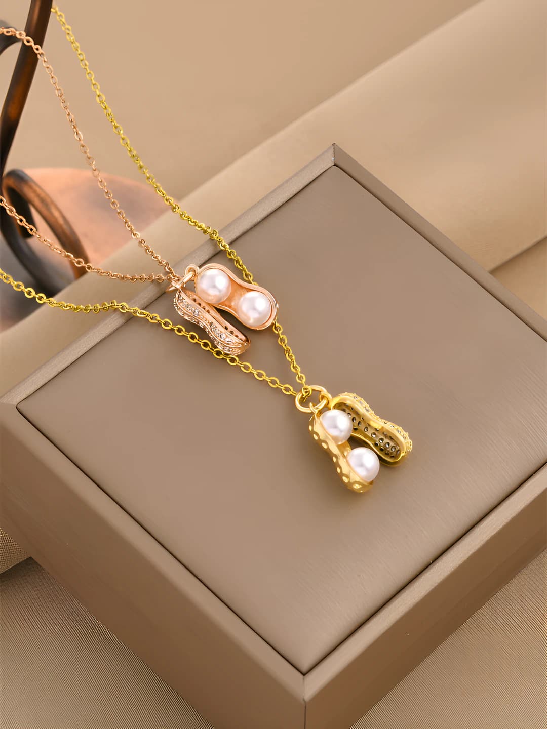 Women's retro necklace with titanium steel chain and zircon peanut pendant