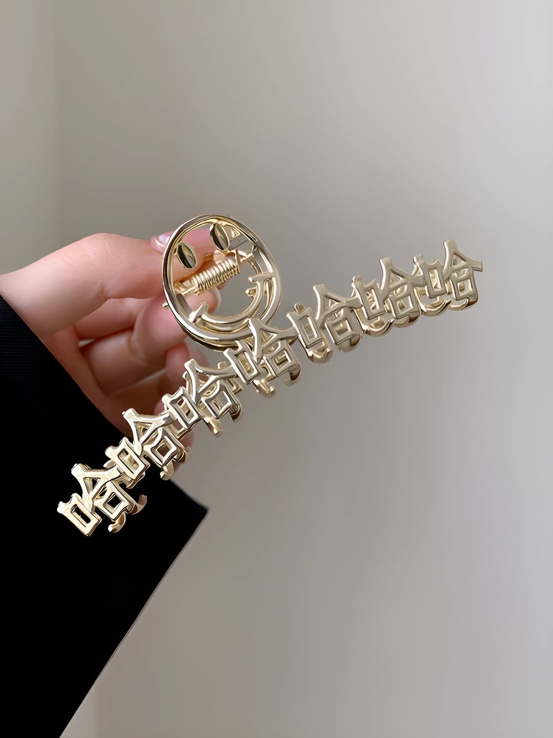 Gold laugh clip