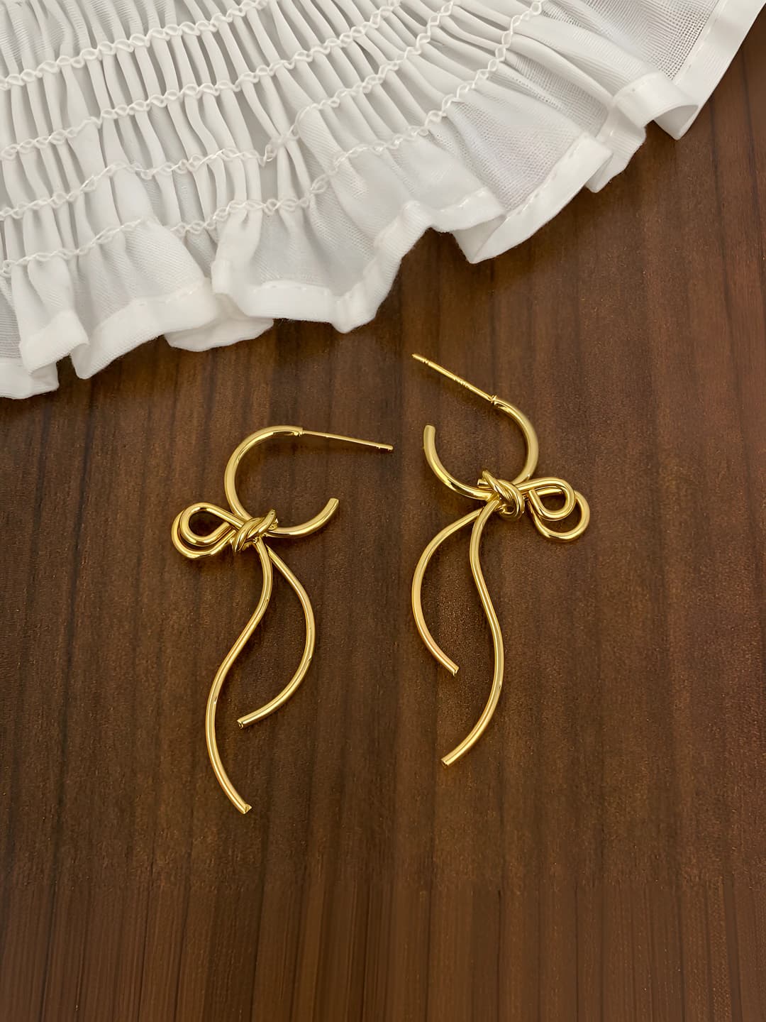 Gold bow earrings