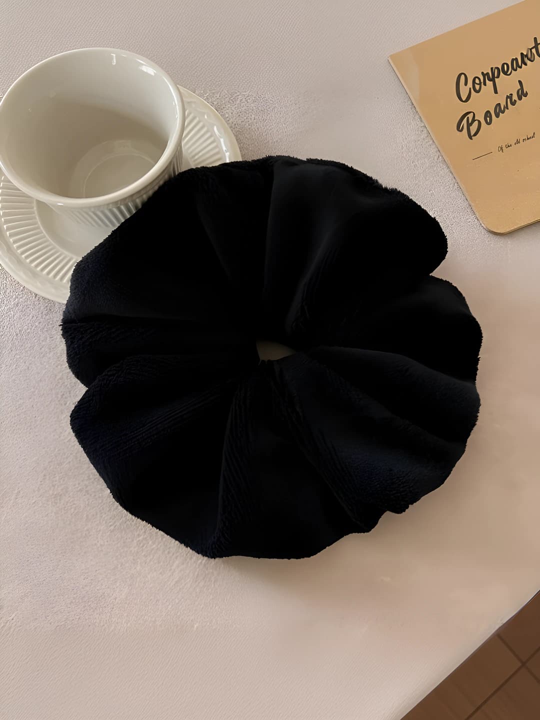 Black towel hair tie