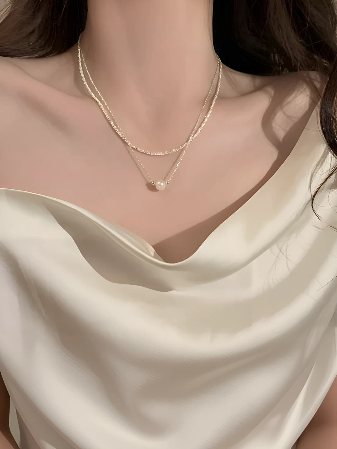 Women's two-layer pearl necklace with handmade bow and chain design