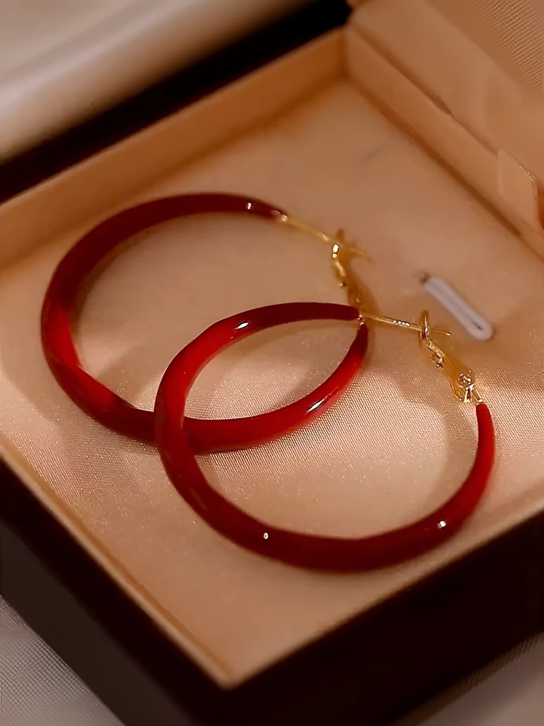 Red circle earrings