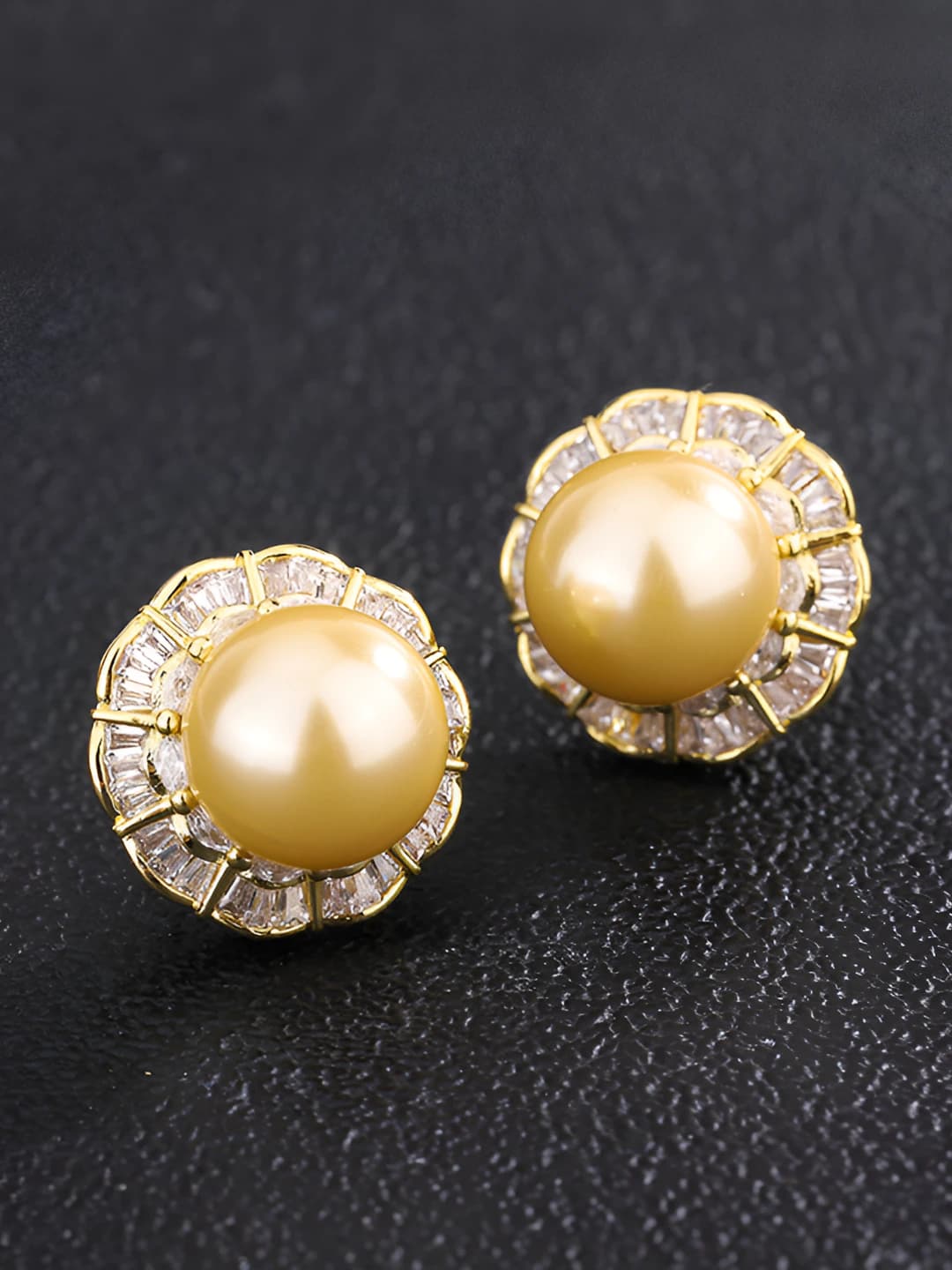 Gold stud earrings