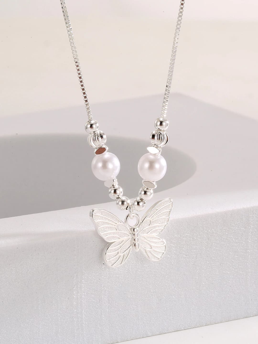 White pearl butterfly bracelet