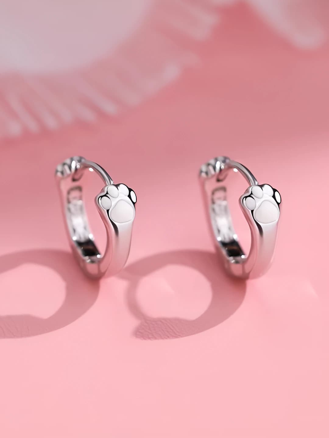Women's copper hoop earrings with cat paw design, natural style