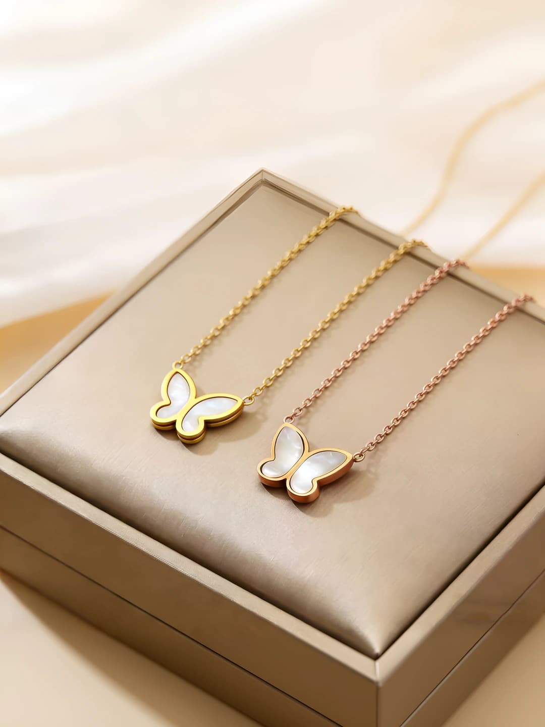 Women's Korean style titanium steel necklace with rose gold, white mother of pearl, and butterfly shell pendant with cubic zirconia