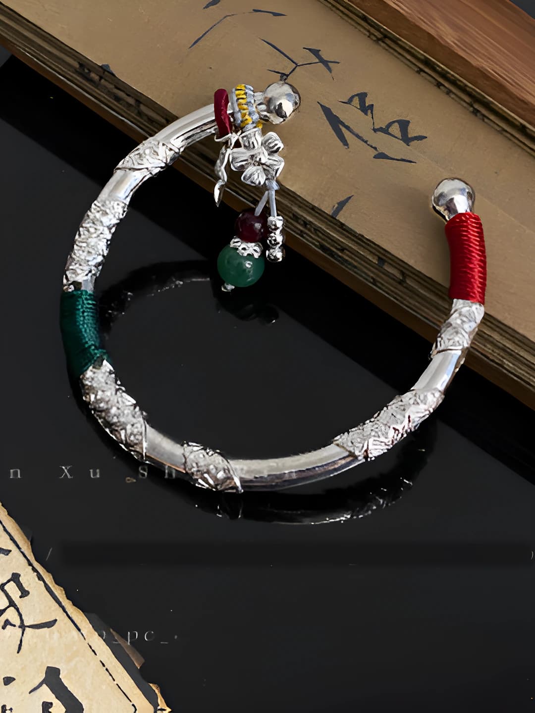 Floral tassel bangle