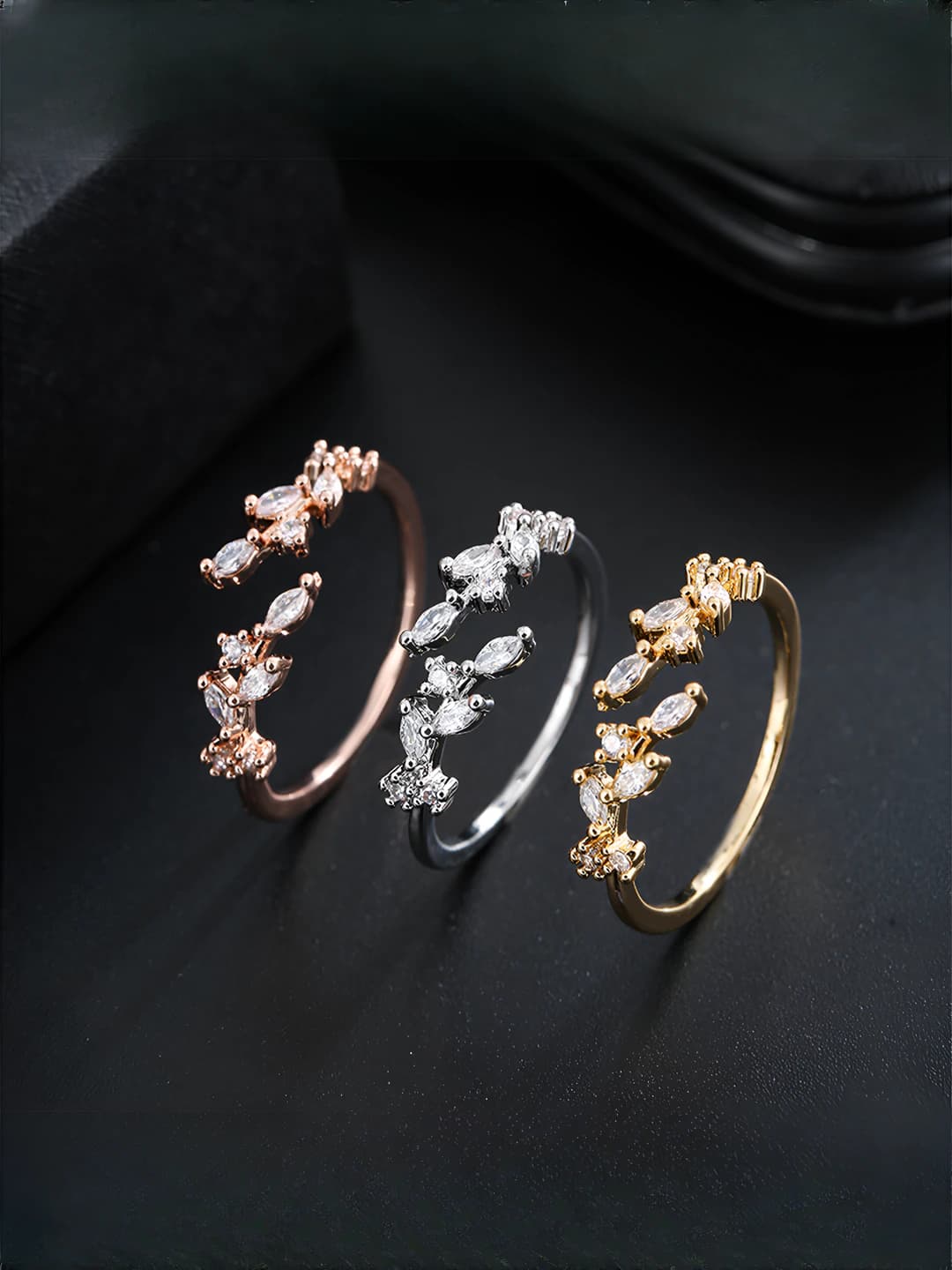 Women's open ring in Korean style with geometric shape, leaf design element, and zircon inlays