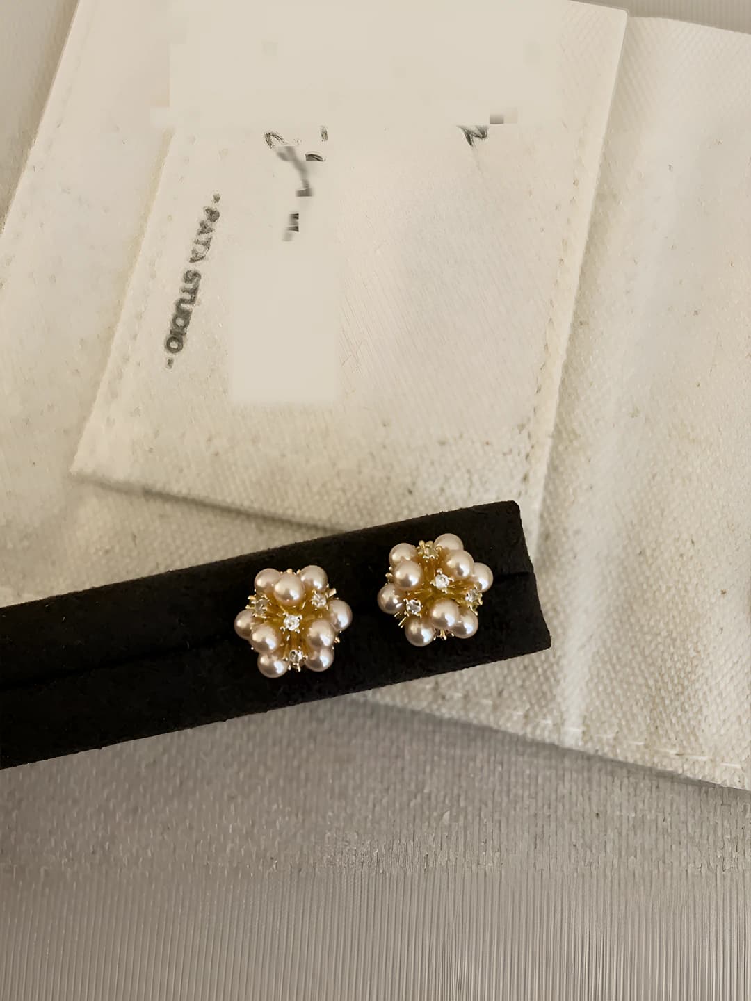 Gold pearl earrings