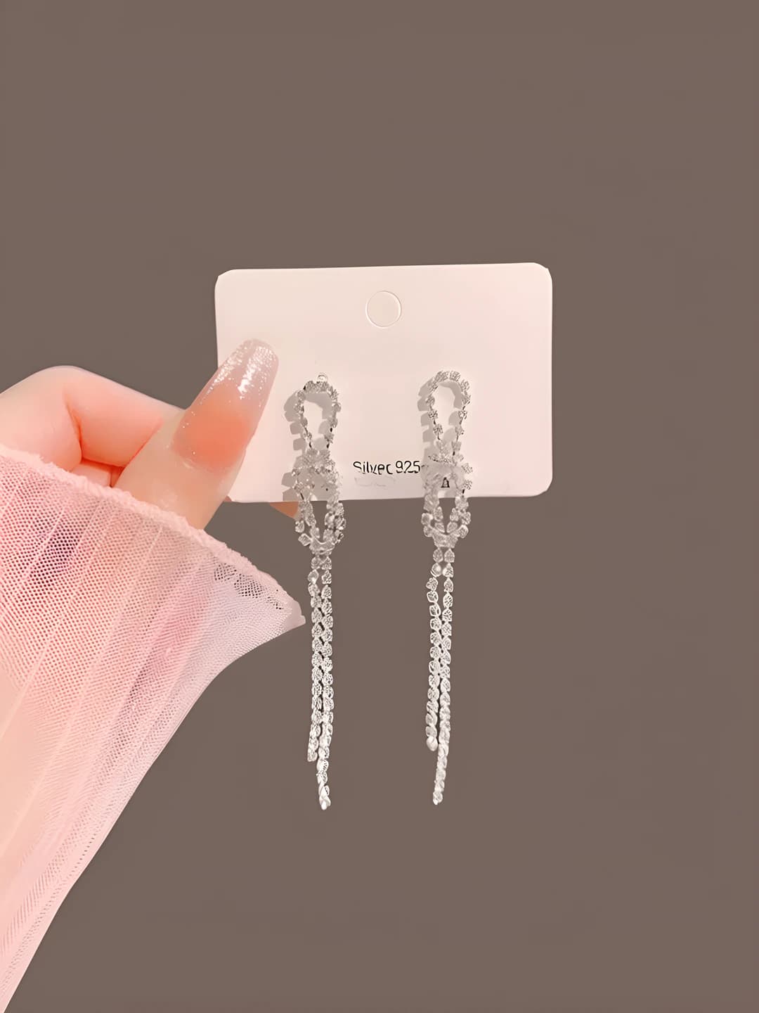 Silver, long, tassel