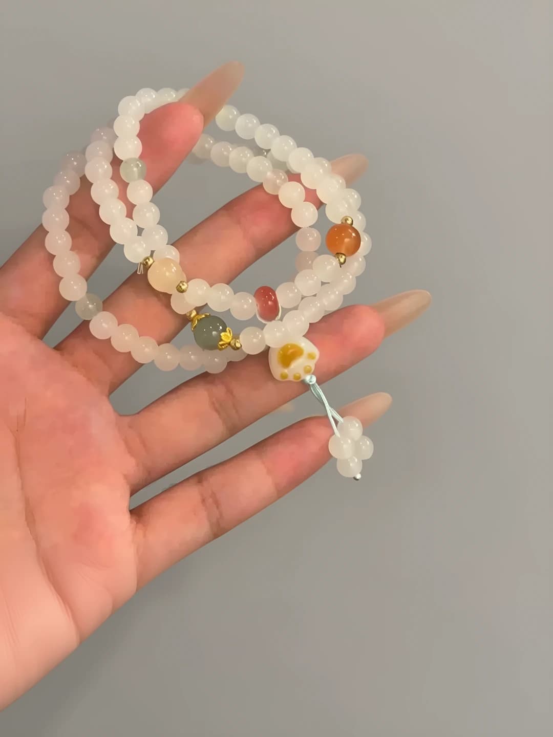 White triple layer cat paw bracelet