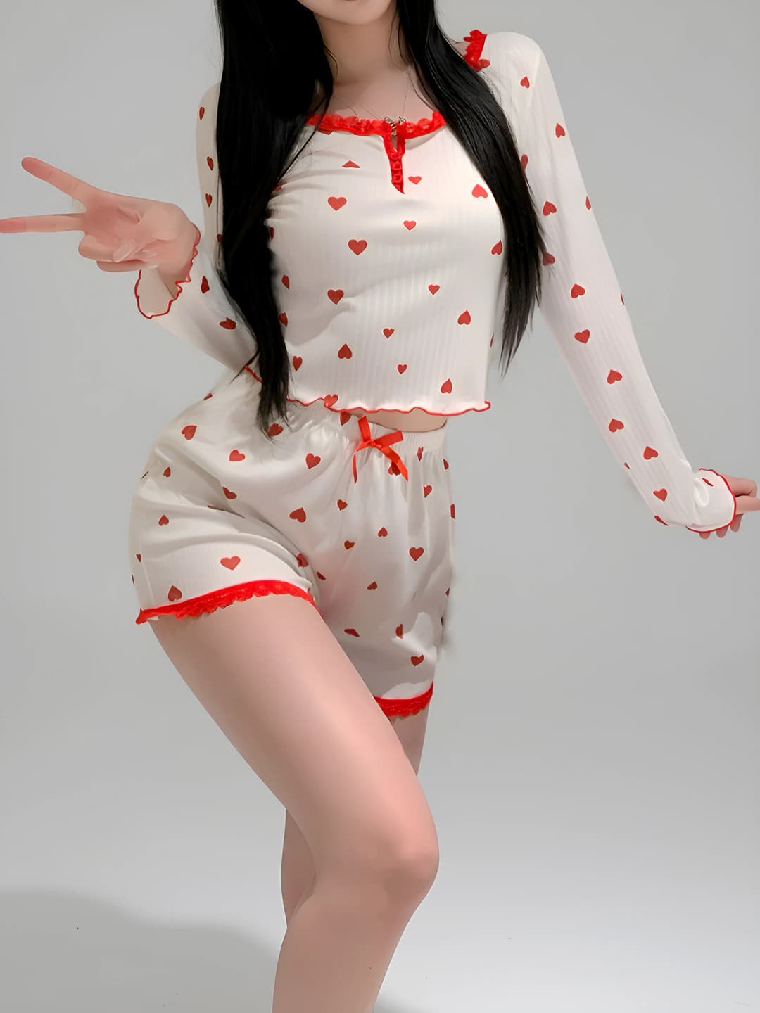 Women's printed pajama set with heart and bow design, long sleeve (top and shorts)