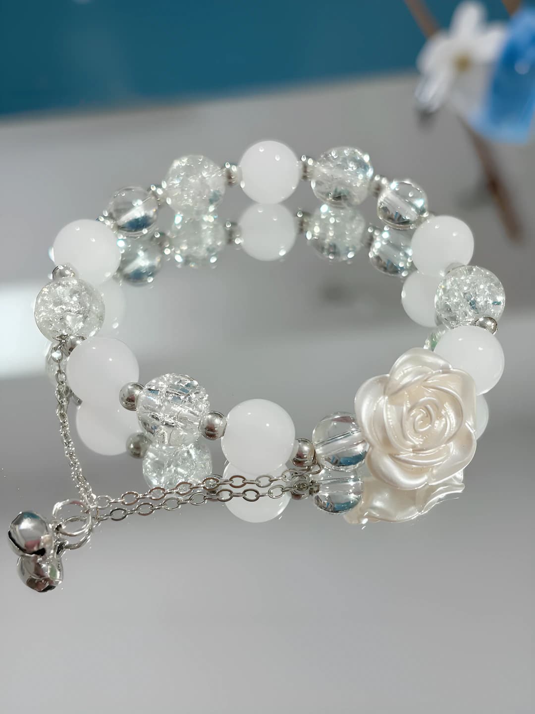 Women's bracelet: exclusive design, handmade, glass and glassware beads in camellia flower and bell shape