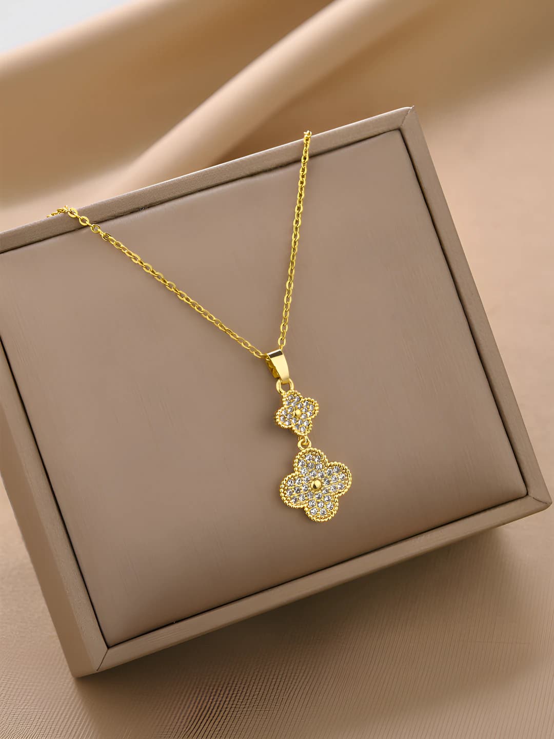 Women's two-layer titanium steel necklace with four-leaf clover and geometric design