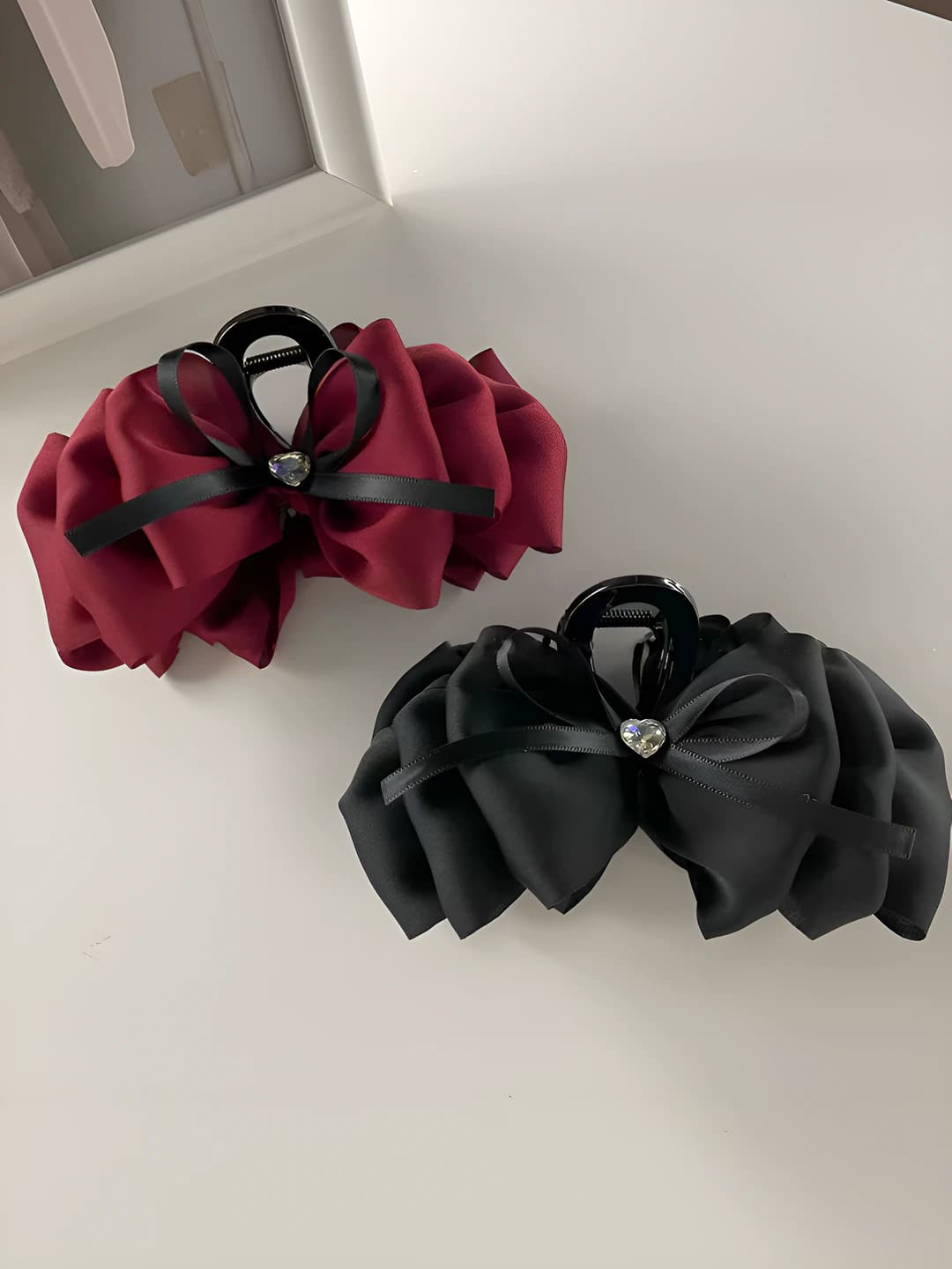 Women's Korean style hair claw clip with bow and heart design element