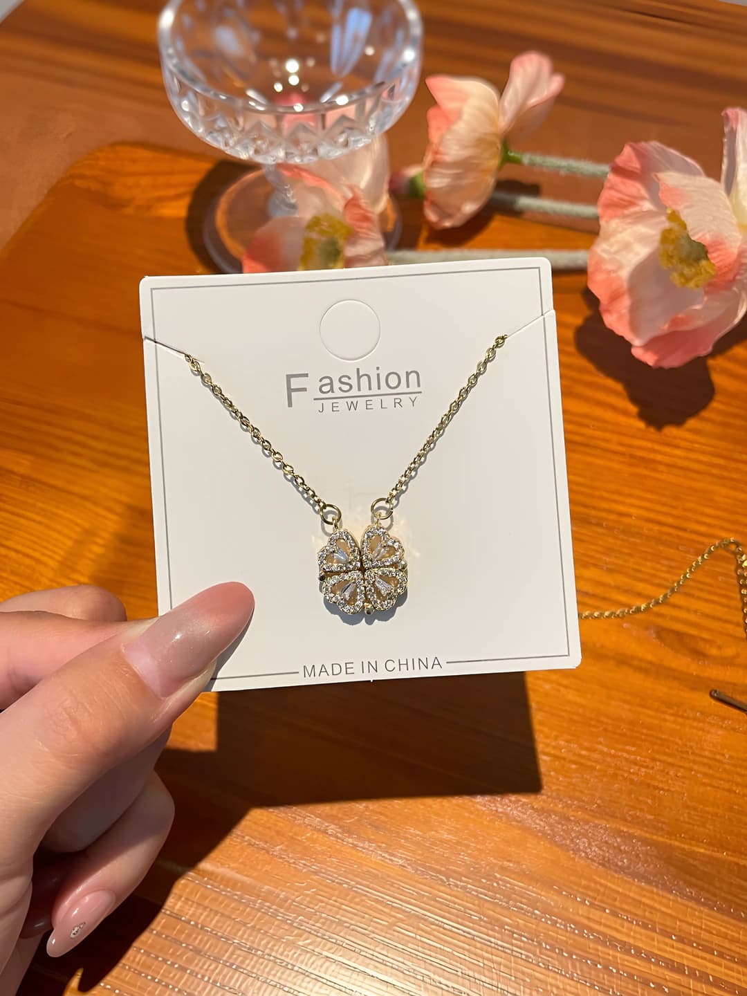 Gold openable clover necklace