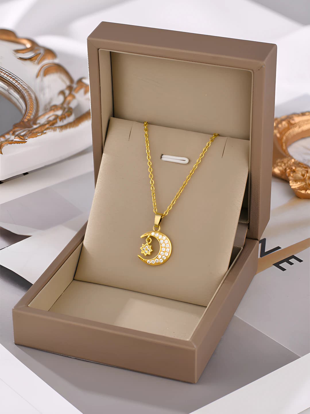 Women's titanium steel necklace with star and moon design and zirconia