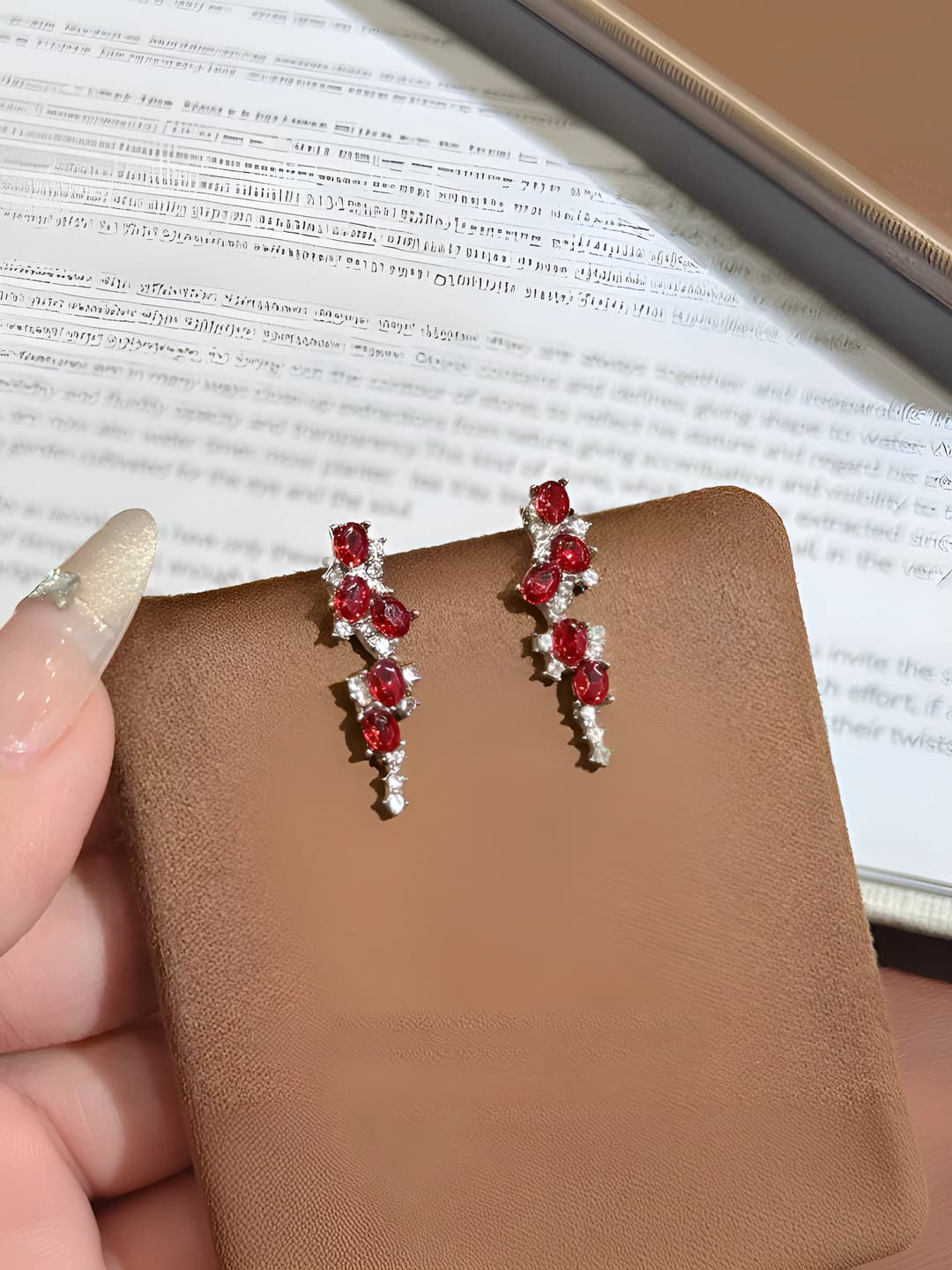 Women's red geometric earrings with crystal design