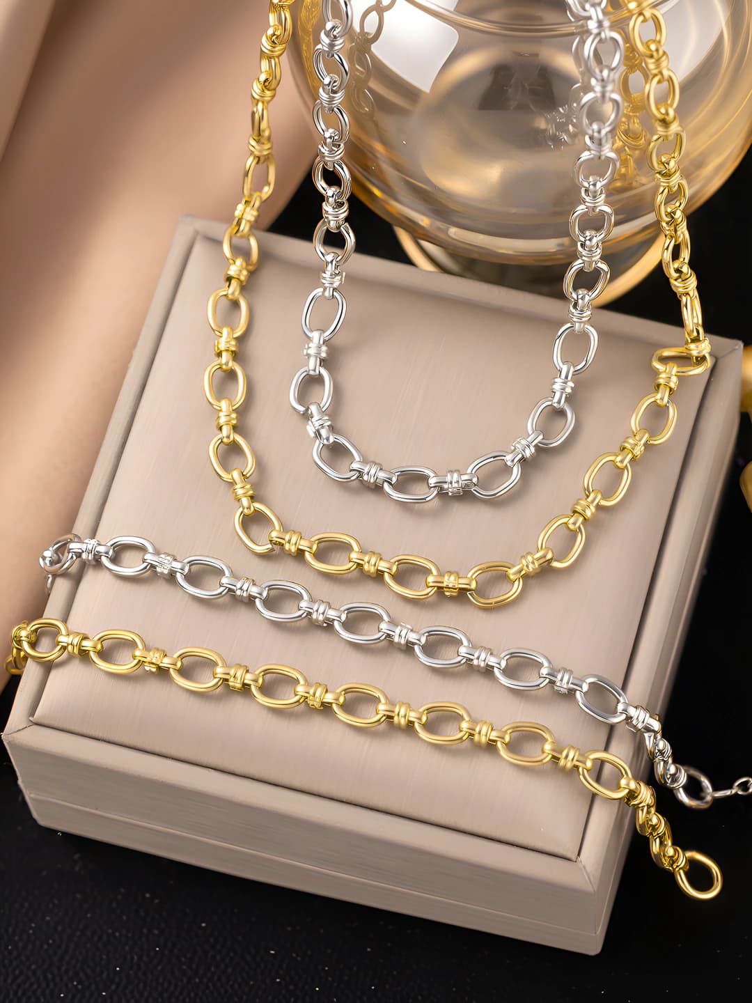Women's titanium steel chain bracelet and necklace with 18k gold plating