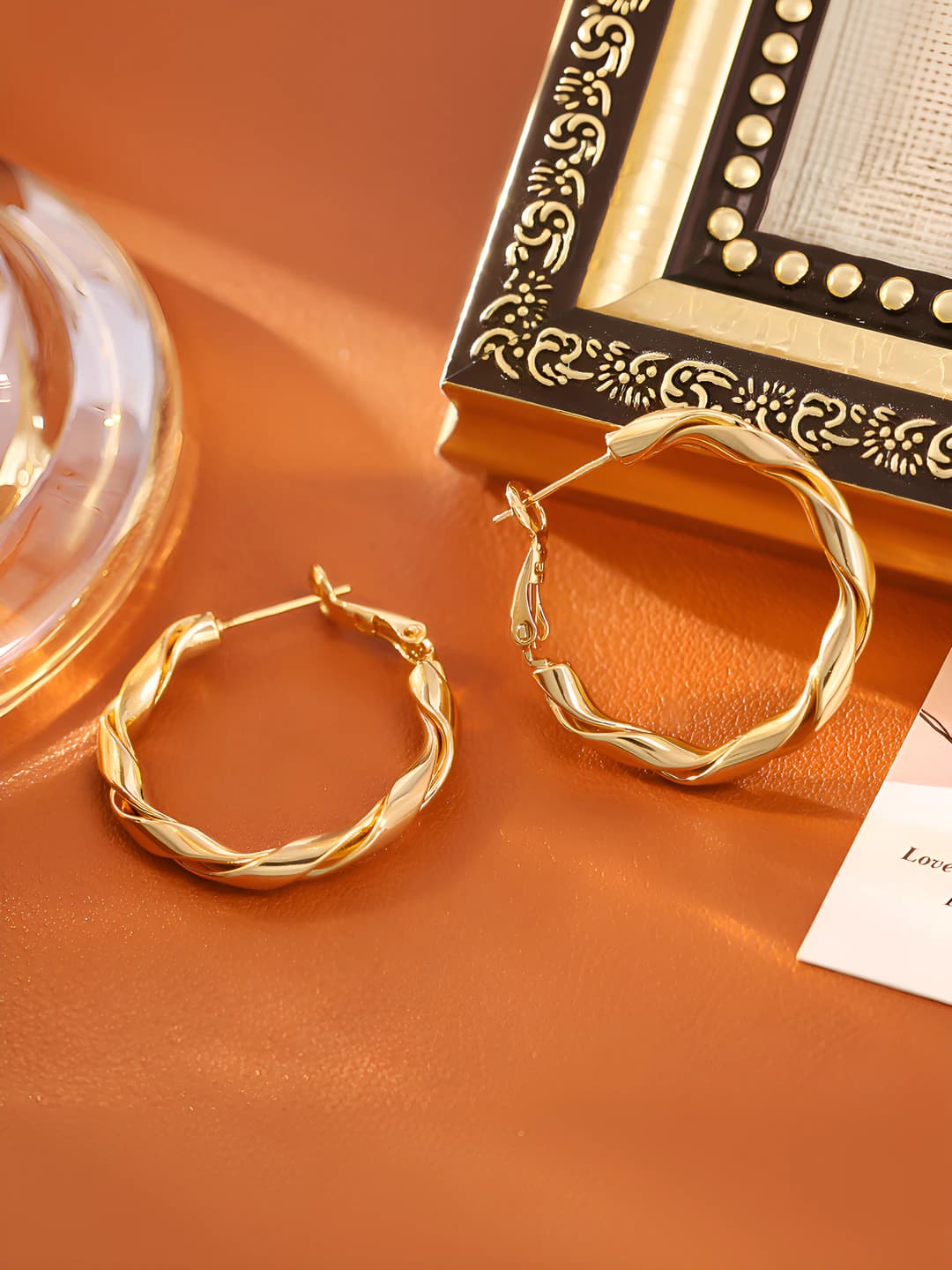 Женские серьги-кольца с плетением «косы» и покрытием 18K золотом