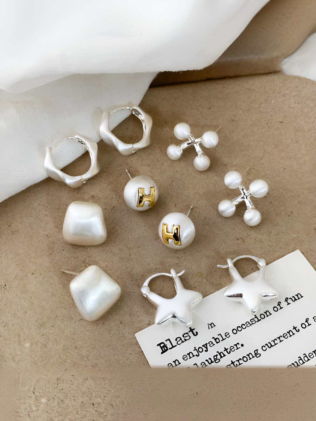 Women's set of silver brushed geometric stud earrings