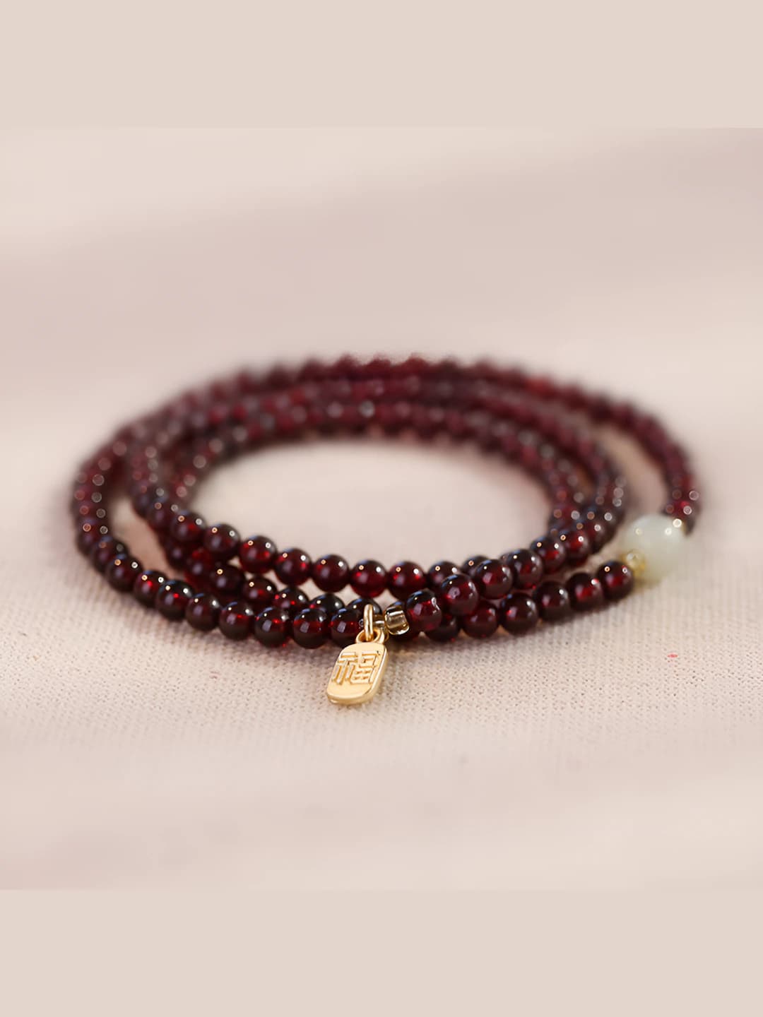 Garnet, triple strand, luck
