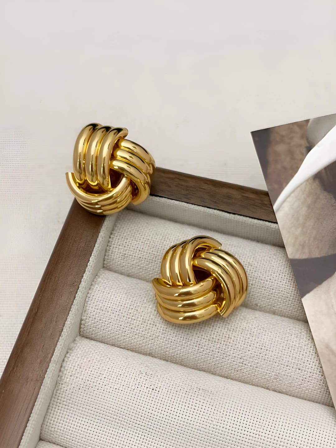 Gold stud earrings