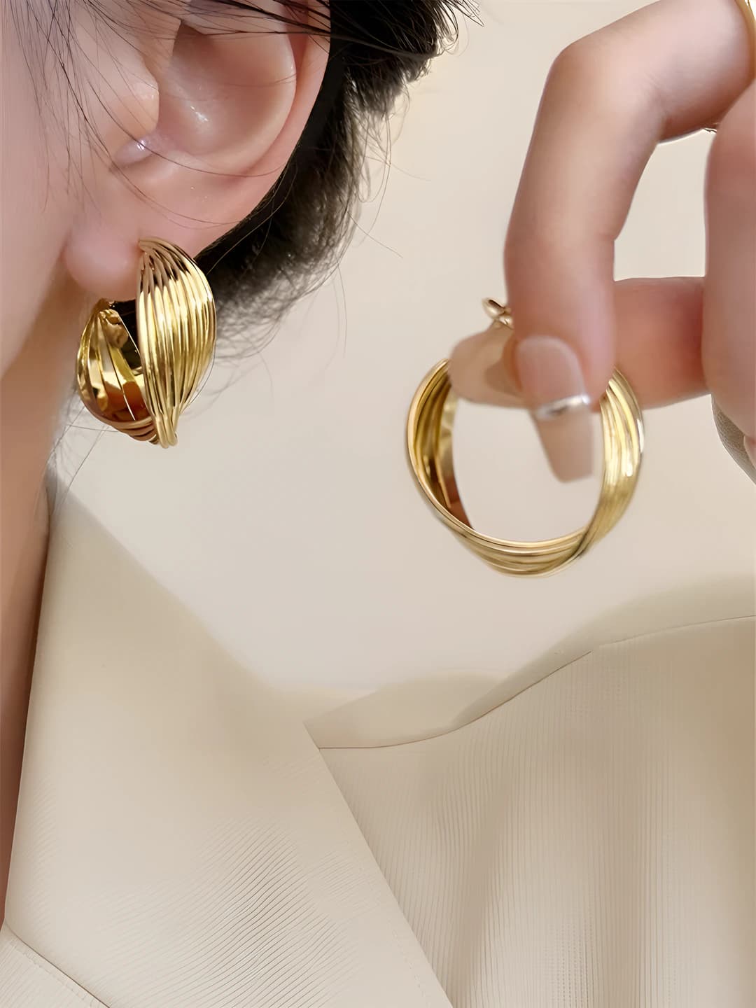Women's metal hoop earrings with 18k palladium plating, geometric design element, business style