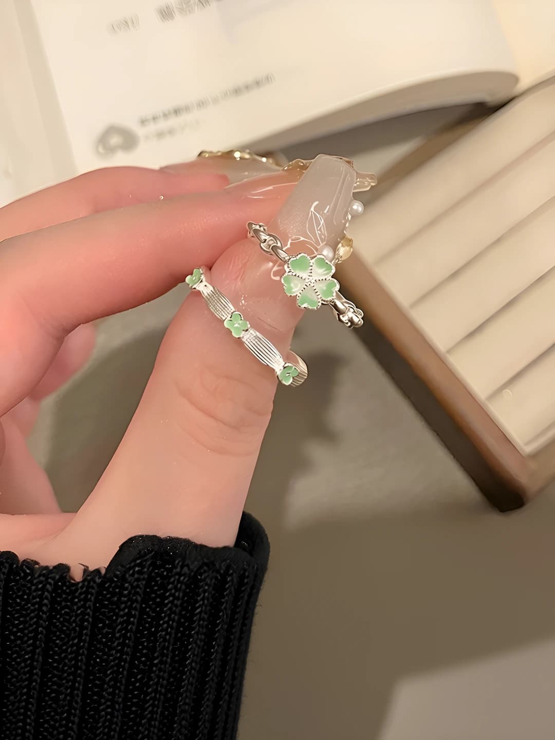 Women's 2026 retro style ring with four-leaf clover design in dark green natural tone