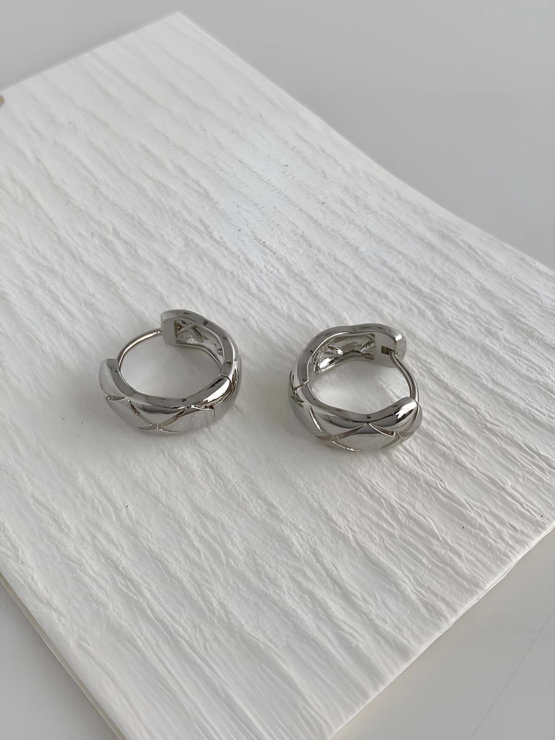 Silver, diamond pattern ear clips