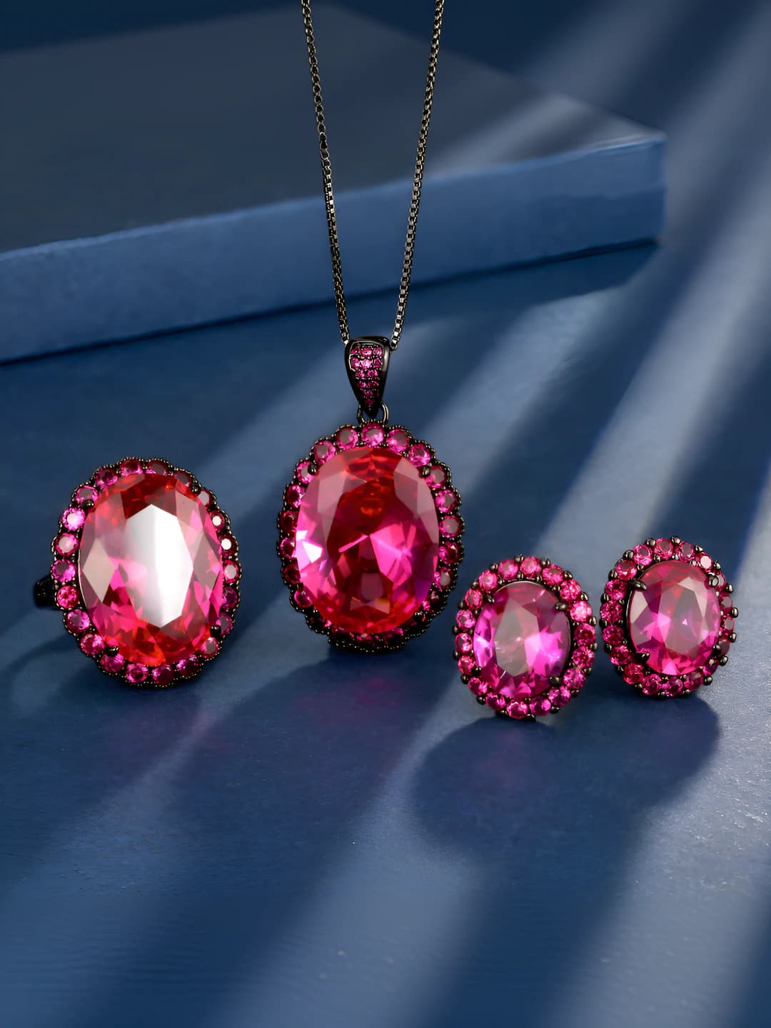 Women's 2026 set with red synthetic ruby, gold-plated copper base, egg-shaped