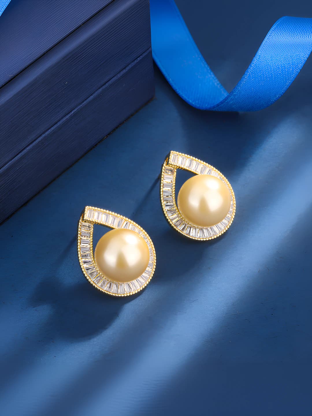 Gold pearl yellow gold stud earrings