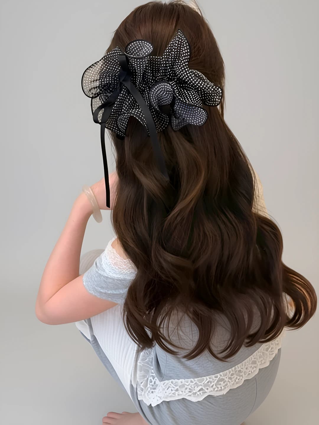 2# Black polka dot ribbon banana clip approx 13 cm