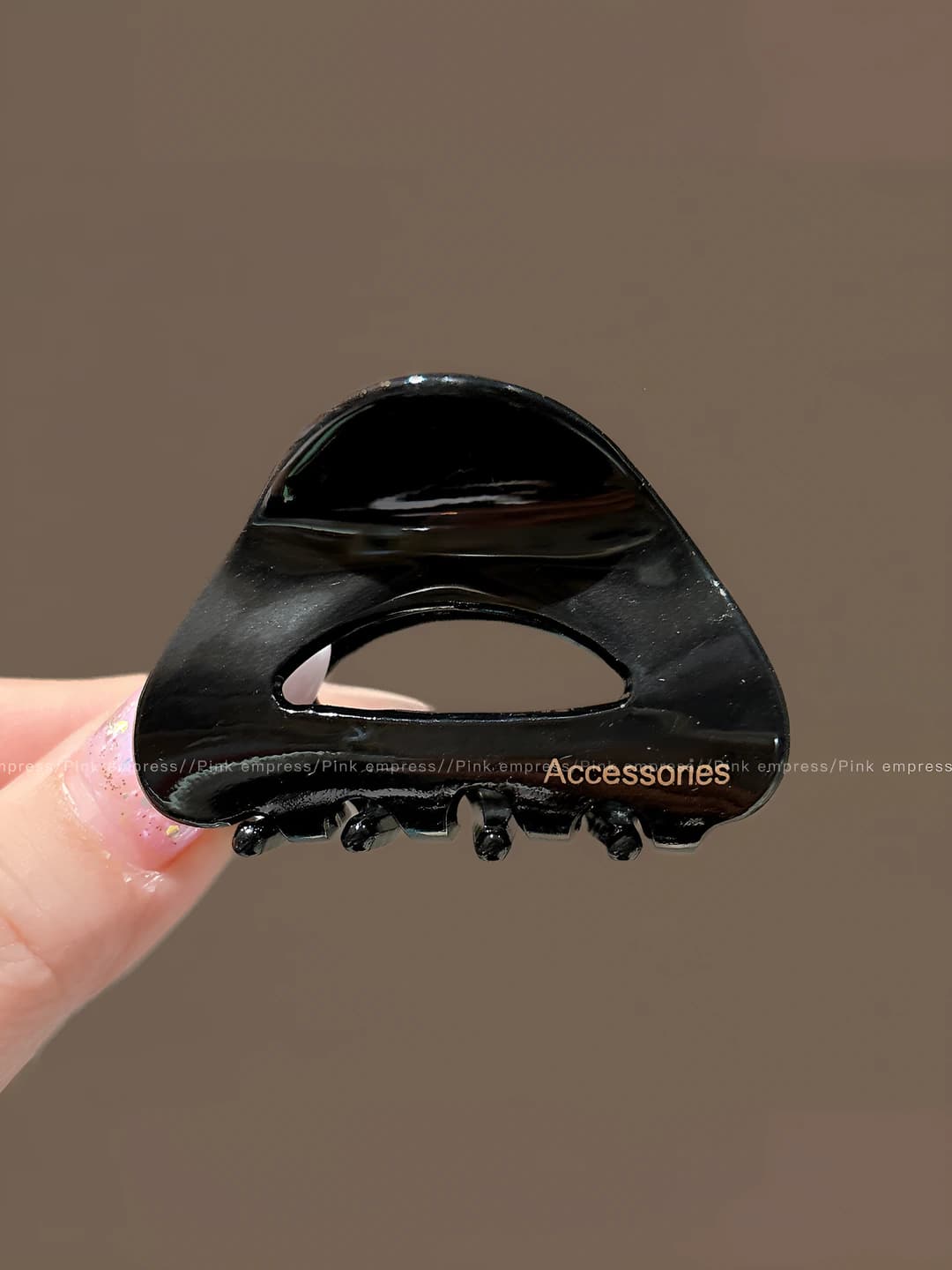 Black small clip ~5 cm