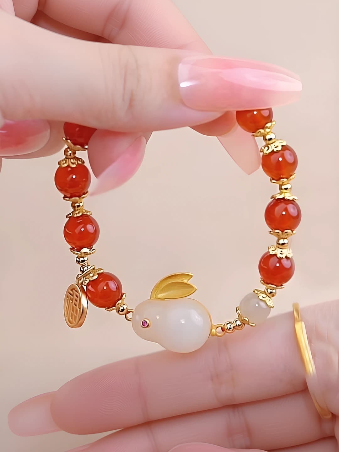 Red beaded jade rabbit