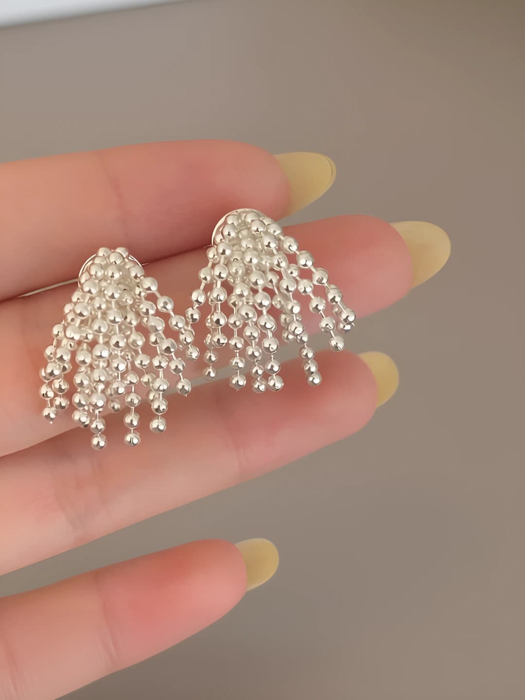 Silver tassel stud earrings