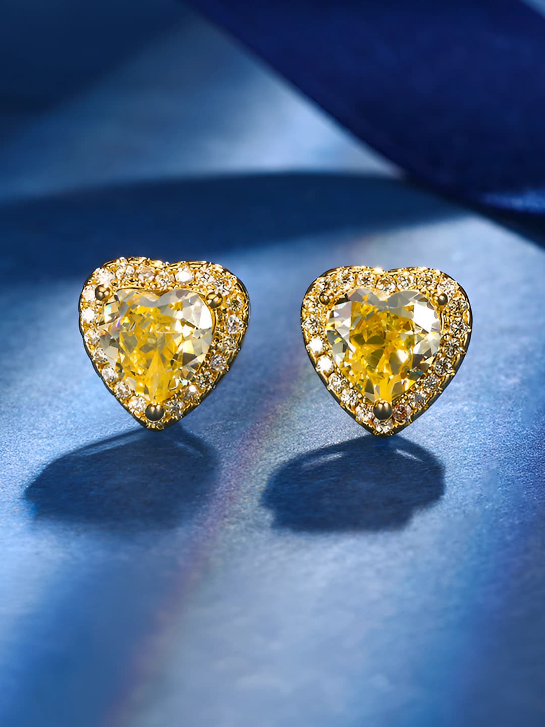 Ice cut yellow diamond studs