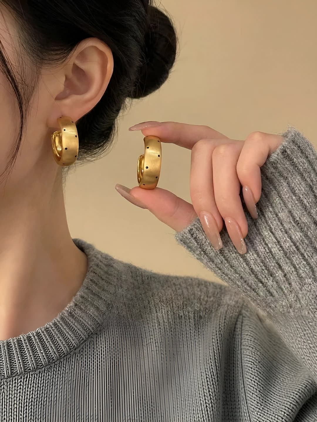 Gold brushed with black dots earrings
