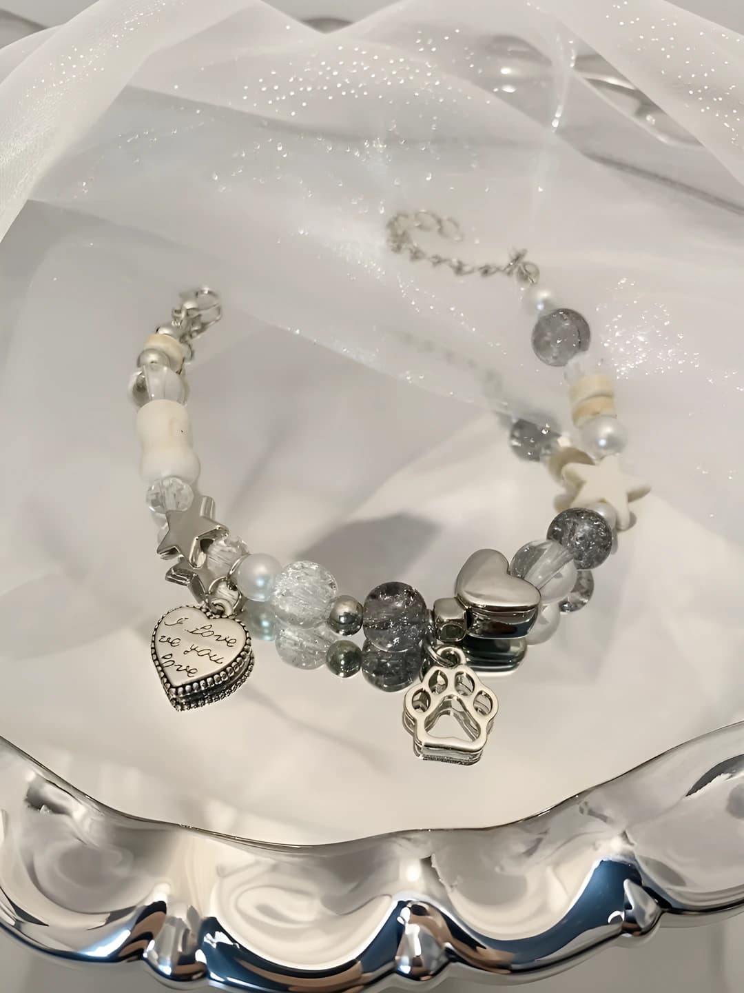 Women's bracelet with stars, cat claws and bones, mixed material, handmade, 2026