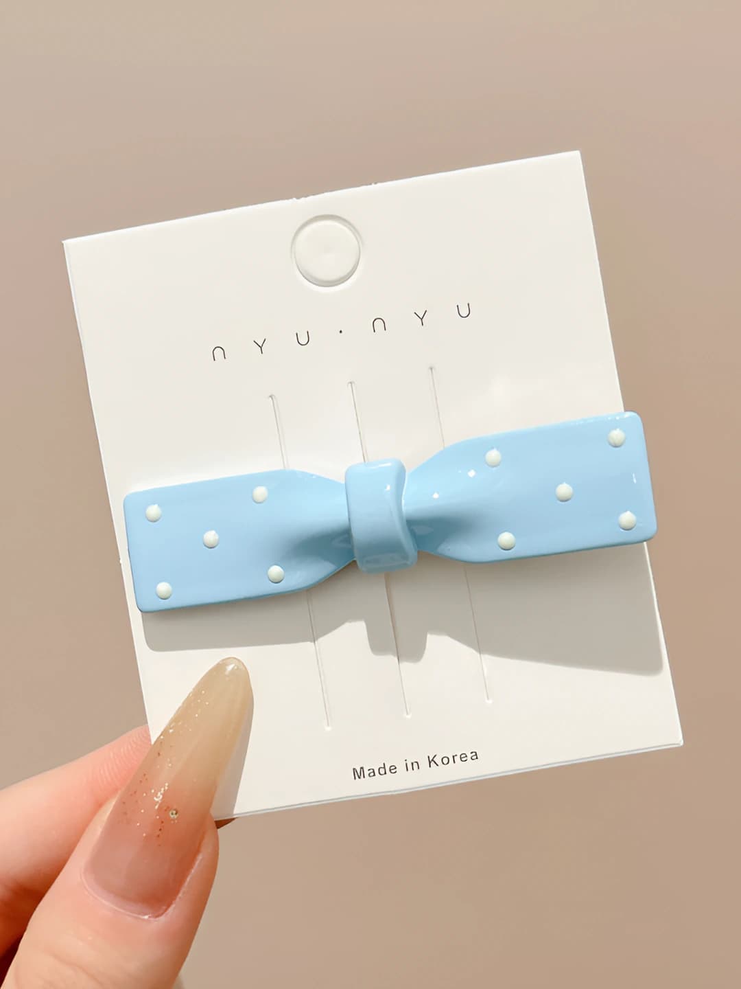 3# Blue bow, oval, ~6.5 cm