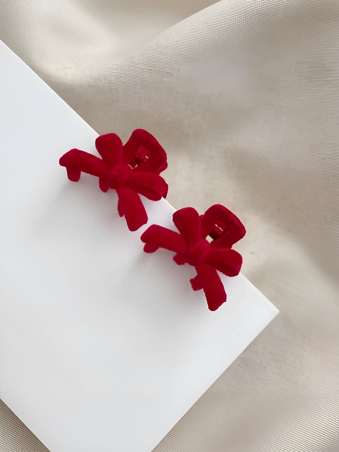 Red velvet clip pair