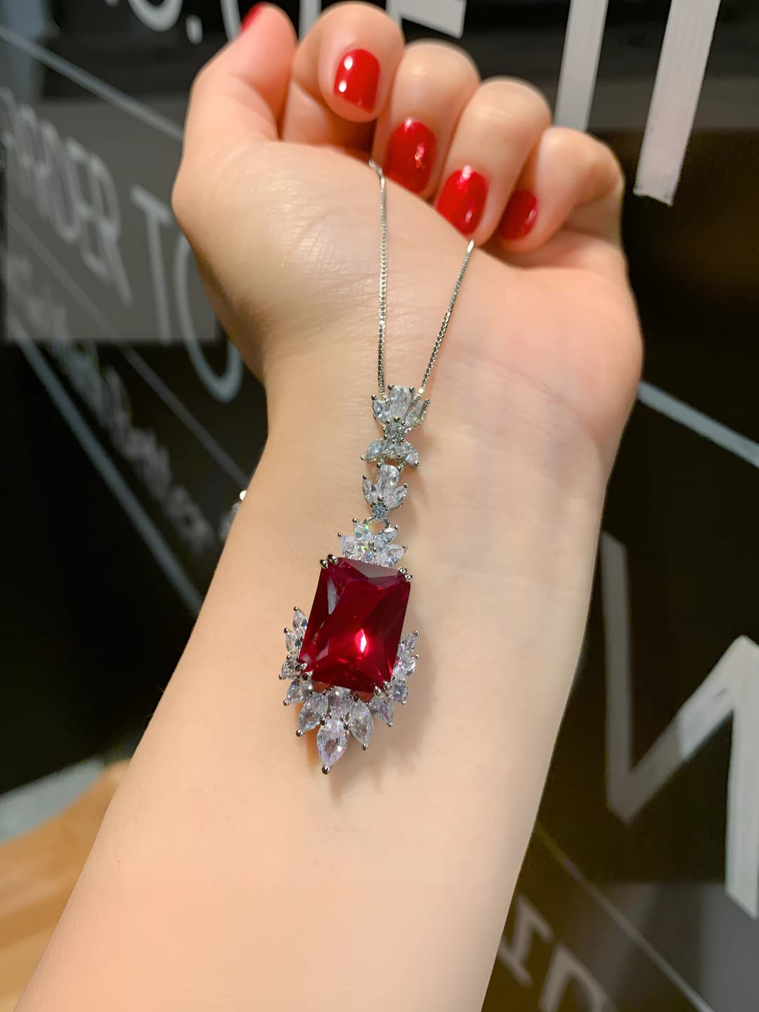 Red glass pendant with chain