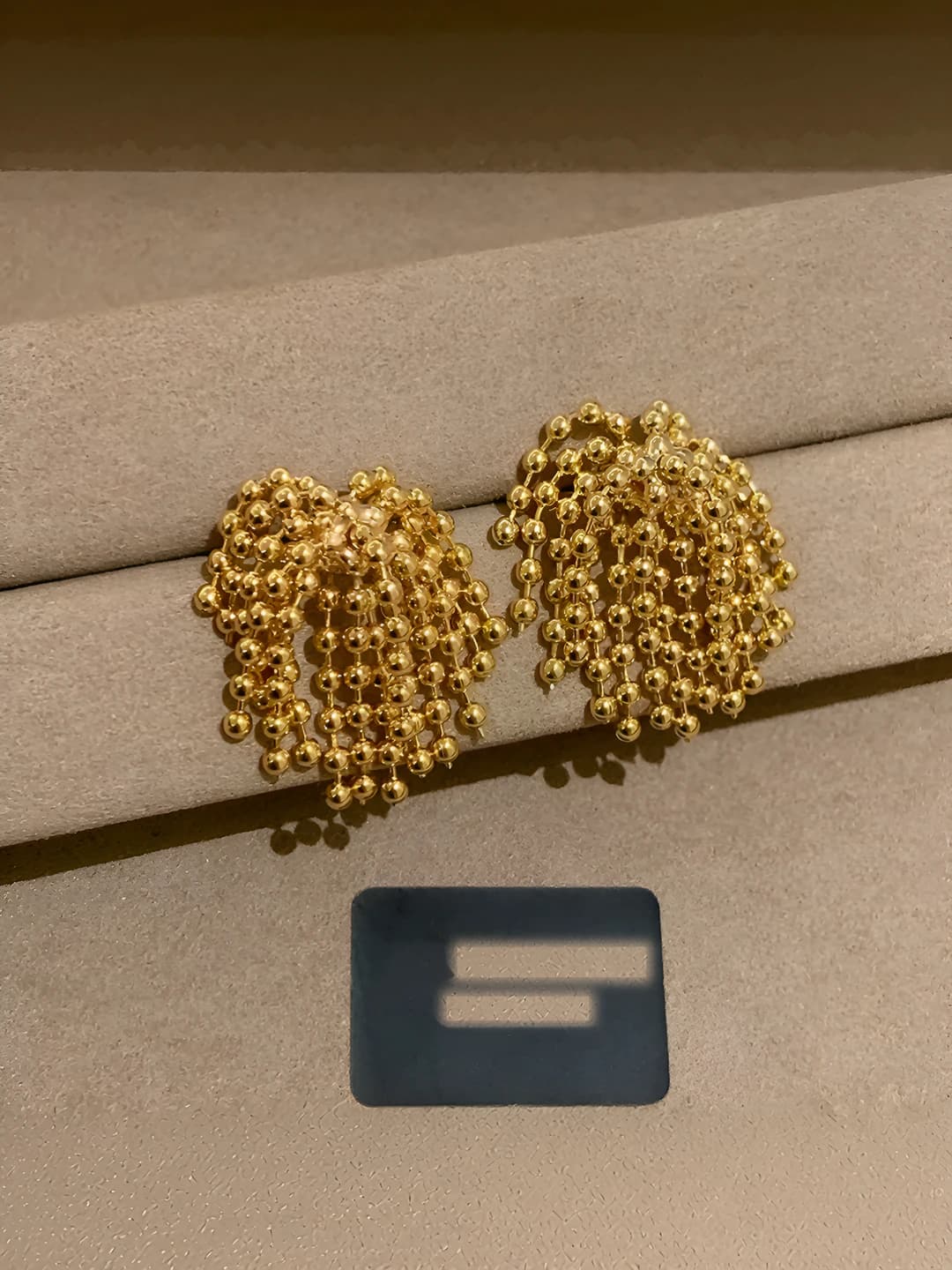 Gold tassel stud earrings