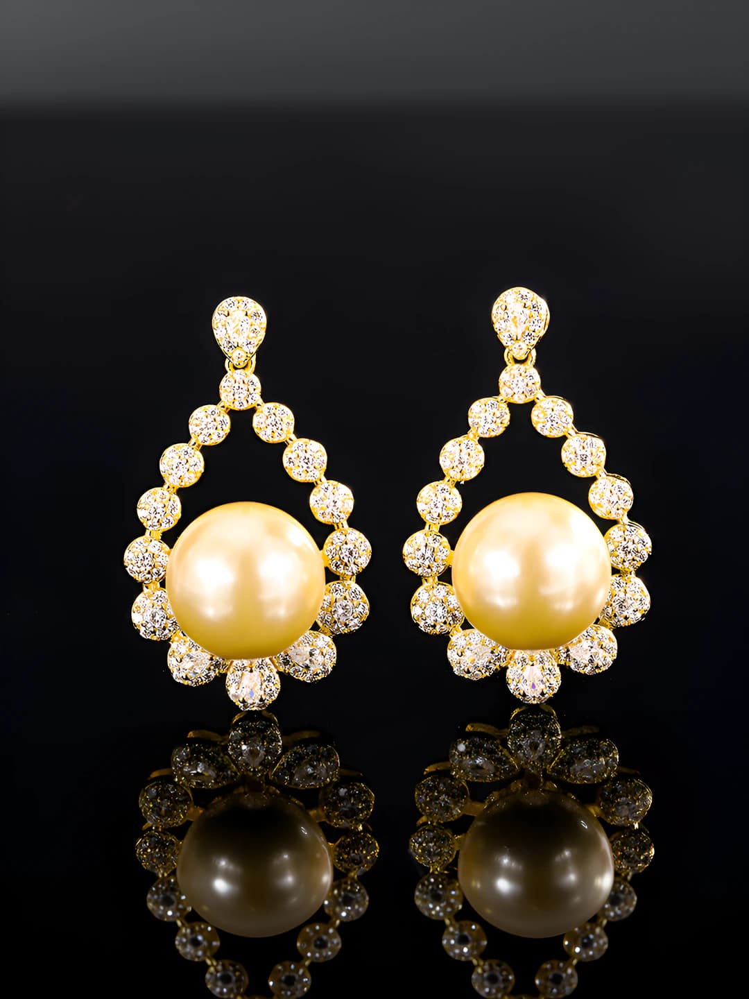 Gold stud earrings
