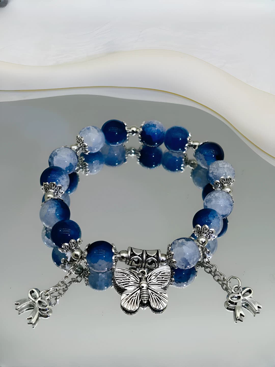 Jade teal butterfly double tassel