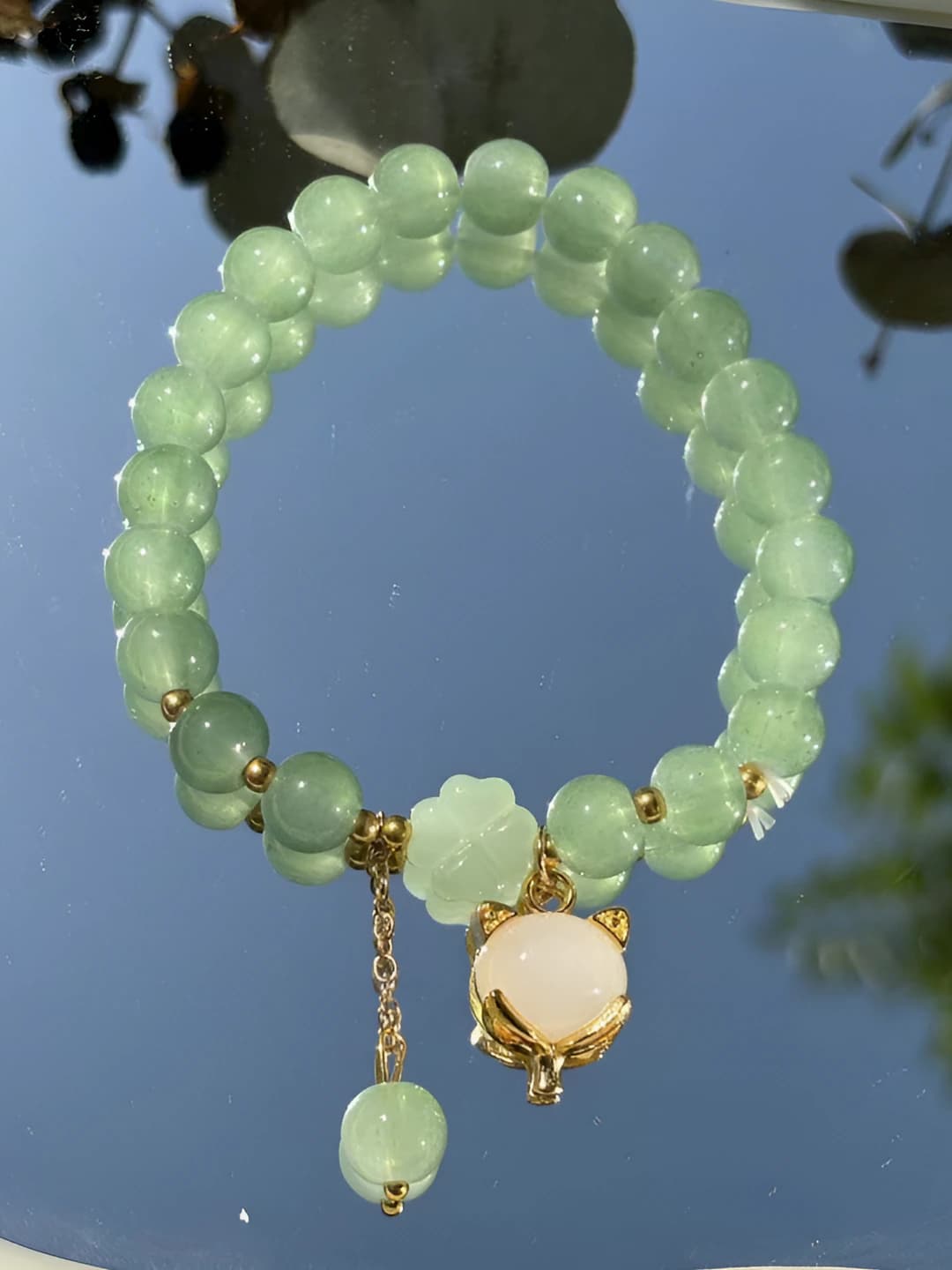White fox, jade bracelet