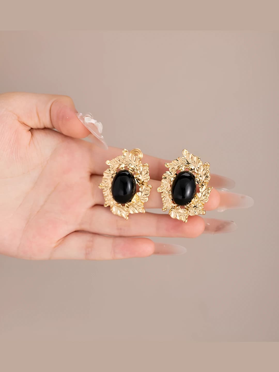 Black oval metal earring