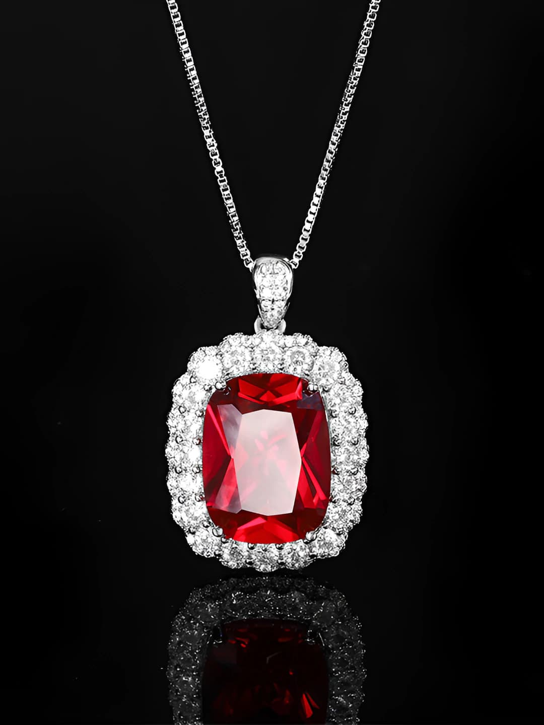 Red ruby pendant with chain