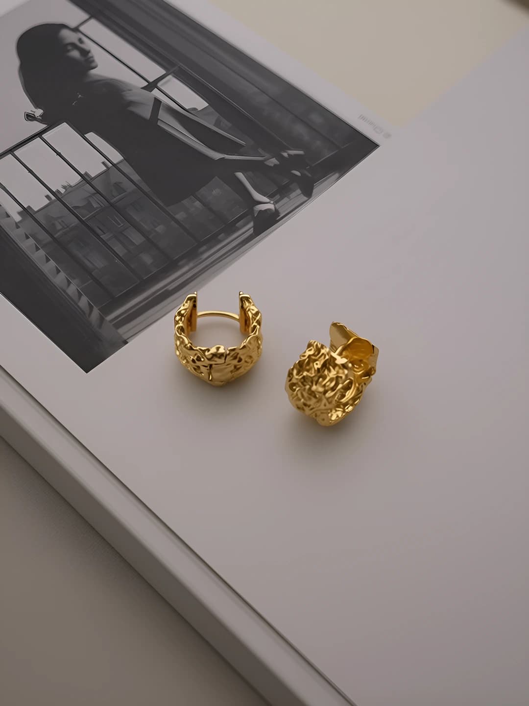 Gold stud earrings