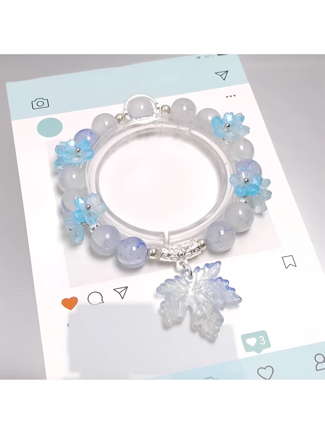 Falling maple leaf bracelet blue